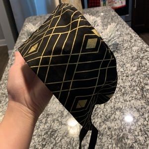 Black and gold scrub cap